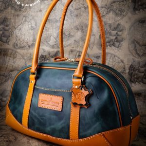 Выкройка кожаной дорожной сумки размером 44х25х22 см.