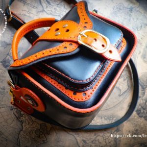 Выкройка для кожаной женской сумки с двумя ручками и застежкой.