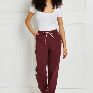 Выкройка вязаных спортивных штанов для женщин размеров от XS до XL.