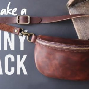 Маленькая кожаная сумка через плечо с узором (поясная сумка).