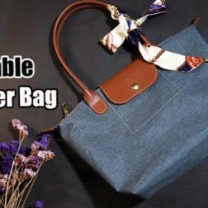 Кожаная складная сумка-шоппер с узорчатым дизайном.