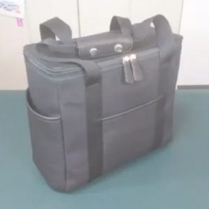 Многофункциональная сумка из ткани с рисунком, подходящая для пикника, хранения инструментов или других предметов.