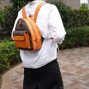 Выкройка небольшого кожаного женского рюкзака в форме яйца с накладным передним карманом.