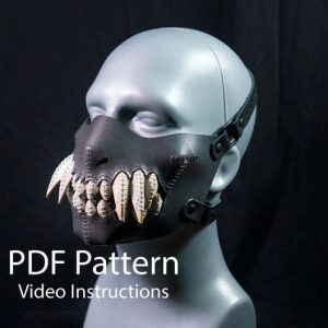 Выкройка кожаной маски с изображением зубов.