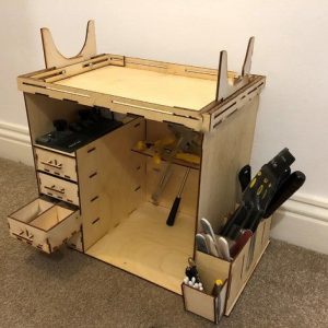 Макет органайзера для инструментов с различными отсекциями для упорядочивания мелких предметов и инструментов.