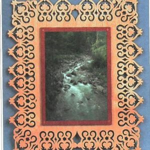 Детализированный макет резной фоторамки для лазерной резки с декоративными элементами.